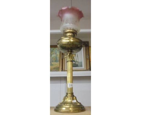 A brass Corinthian column oil lamp with later etched glass shade. COLLECT ONLY.Glass parts undamaged. Brass patinated to surf