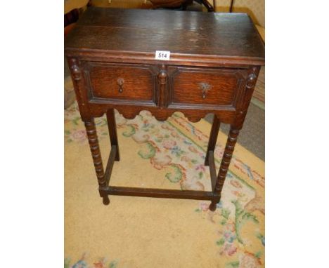 A two drawer Edwardian hall table on bobbin turned supports. COLLECT ONLY.