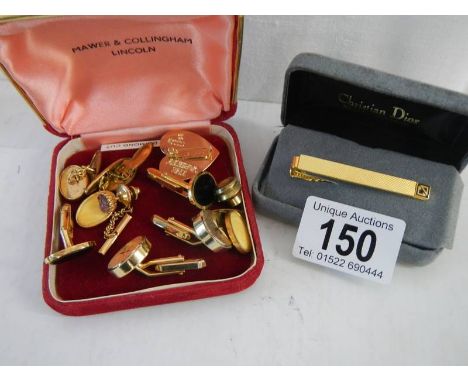 A mixed lot of cuff links, tie clips etc.,