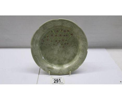 An unusual art pottery plate - possibly Chinese.