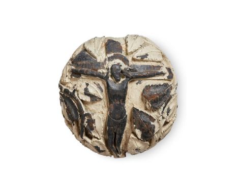 A CARVED OAK CEILING BOSS  LATE 16TH/EARLY 17TH CENTURY  Carved with central scene of the crucifixion, stiff leaf surround  4