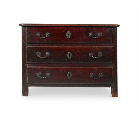 A FRENCH PROVINCIAL CHESTNUT AND WALNUT COMMODE  MID 18TH CENTURY  88cm high, 123cm wide, 68cm deep  Condition Report:  Marks