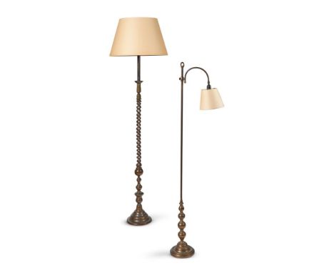 A PATINATED BRASS STANDARD LAMP  20TH CENTURY  With open spiral column, later fitted for electricity, with a cream coloured c
