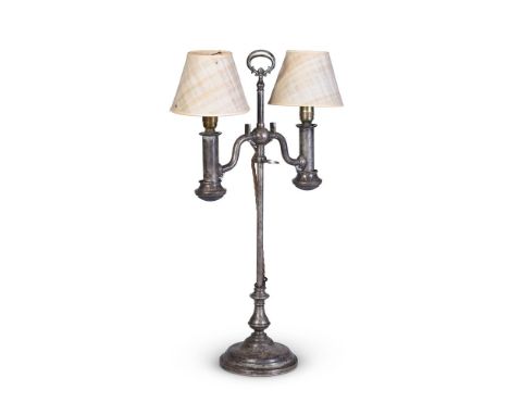 A SILVERED BRASS OIL LAMP  LATE 19TH CENTURY, POSSIBLY FRENCH  Now fitted for electricity with twin lights with papyrus shade