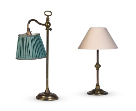 A VICTORIAN BRASS TABLE LAMP   LATE 19TH CENTURY   With plain cream shade, knopped stem now fitted for electricity  44cm high