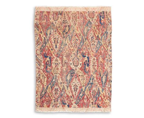 A CAUCASIAN DRAGON FRAGMENTARY CARPET 17TH CENTURY Approximately 362 x 267cm  This large and early fragmentary rug represents