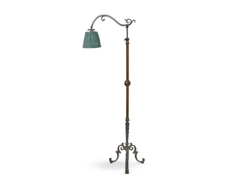 A BRASS STANDARD LAMP  LATE 19TH CENTURY AND LATER  With adjustable reading light with green fabric shade, telescopic pole no