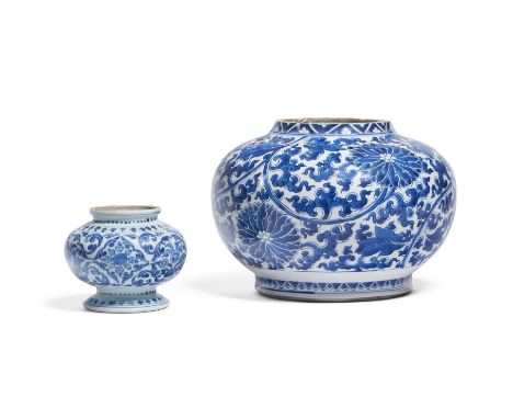 A CHINESE BLUE AND WHITE VASE  KANGXI (1662-1722)  17cm high Together with a small jar for the Islamic market  10cm high    C