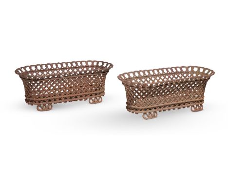 A PAIR OF CAST IRON BASKET JARDINIÈRES OR LOG BINS  20TH CENTURY  32cm high, 88.5cm wide, 39cm deep   Condition Report:  Weat