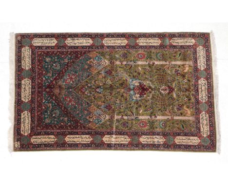 Indo-Persian Prayer Rug India, modern The olive green field with birds and vines beneath a hanging lamp and Mihrab enclosed b