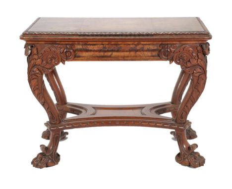 A Victorian Brown Oak Foldover Card Table, mid 19th century, with stiff leaf carved border and hinged leaf enclosing a green 