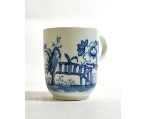 A Worcester Porcelain Coffee Cup, circa 1755, painted in underglaze blue with a fenced garden