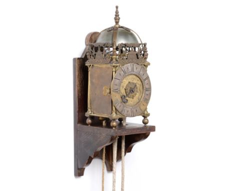 A Small Brass Lantern Form Hook and Spike Alarm Wall Timepiece, signed Kefford, Royston, circa 1730, lantern form case with f