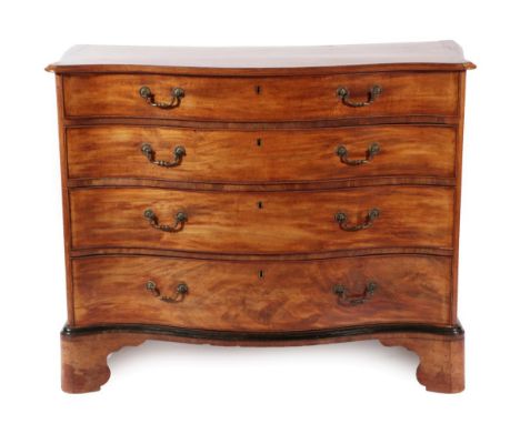 ~ A George III Mahogany and Crossbanded Serpentine Front Chest of Drawers, late 18th century, the four graduated drawers and 