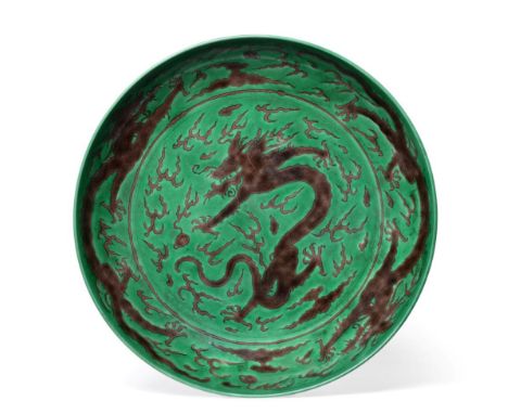 A Chinese Porcelain Green Ground Aubergine Dragon Dish, Kangxi reign mark and of the period, incised and painted with a drago