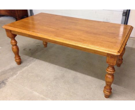 A light oak block pattern kitchen table. 183 x 99cm.
