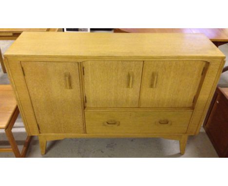 A G-Plan light wood sideboard.