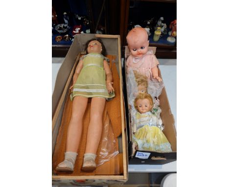 A collection of vintage dolls to include boxed famosa walking doll