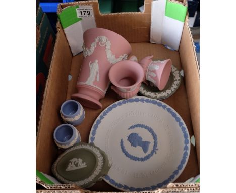 A collection of Wedgwood items including Pink footed vase, small urns, pin dishes, trinket boxes etc (9)