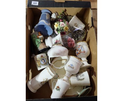 A collection of pottery to include Wedgwood vase, commemorative cups and saucers, plates etc 