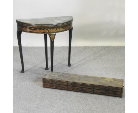 A green painted half round card table, 75cm, together with a canteen chest