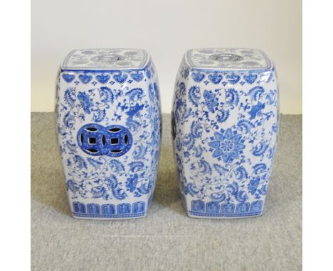 A pair of Chinese porcelain blue and white garden seats, 49cm high