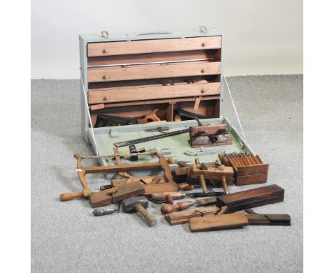 A carpenter's tool box, containing vintage tools, together with a collection of hand tools