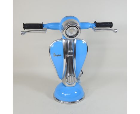 A table lamp, in the shape of a blue scooter, 40cm high