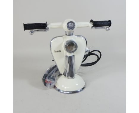 A small lamp, in the shape of a white scooter, 28cm high 