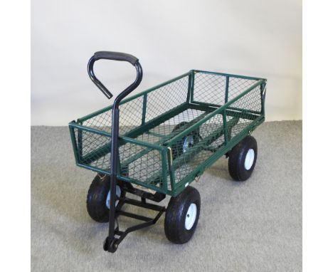 A green metal garden trolley, 105cm long