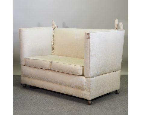 A cream upholstered knole sofa, 160cm