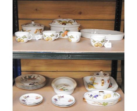 Two shelves of Royal Worcester Evesham pattern dinner wares