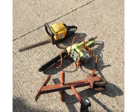 An electric chainsaw, together with a hedge cutter and a winch