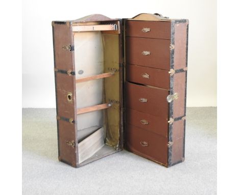 A vintage travel trunk, with a fitted interior, 115cm high