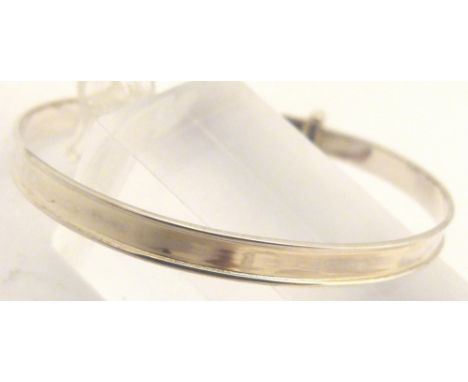 SILVER CHRISTENING BANGLE. Silver baby christening bangle with small diamond in original box and gift bag