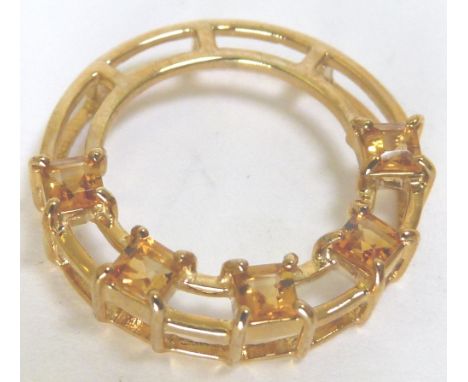9 K CITRINE PENDANT. 9 K gold citrine circle pendant