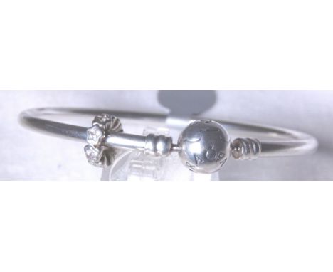 PANDORA CHARM BANGLE. Genuine Pandora sterling sivler charm bangle with a genuine Pandora charm