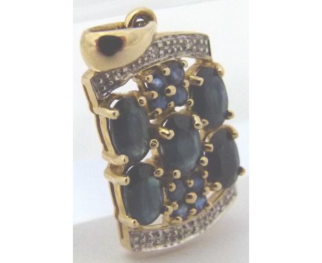 9 K SAPPHIRE PENDANT. 9 K gold dark blue sapphire and diamond pendant, 3,08g