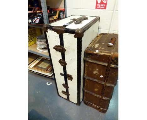 STEEL BOUND TRAVEL TRUNK. Steel bound travel trunk with leather handles