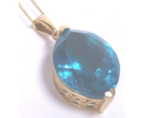 14 K QUARTZ PENDANT. Capri blue quartz pendant on 14 K gold plated chain