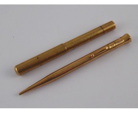 A 9 carat gold piston filler fountain pen, 14 carat gold De La Rue nib, hallmarked London 1939, engraved dedication to barrel