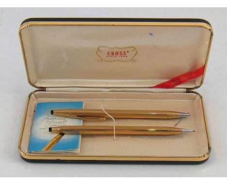 A gold filled Cross ballpoint pen and mechanical pencil, in manufacturer's case.