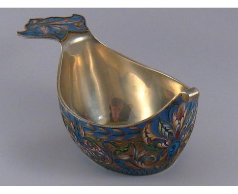 A Russian silver gilt kovsh with lug style handle and flowers in cloisonne shaded enamel on a matted ground. Alexander Lubyav