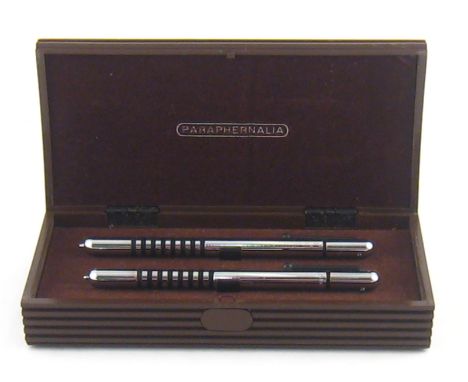 A boxed Paraphernalia ballpoint pen and mechanical pencil set.
