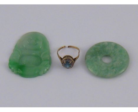 A mixed lot comprising a 9 carat gold blue stone and diamond ring (shank cut, 1.9 gms), and two jade pendanrs.
