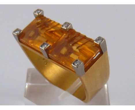 A French hallmarked 18 carat gold citrine and diamond ring of geometric modernist design, approx 2.5cm wide, unascribed maker