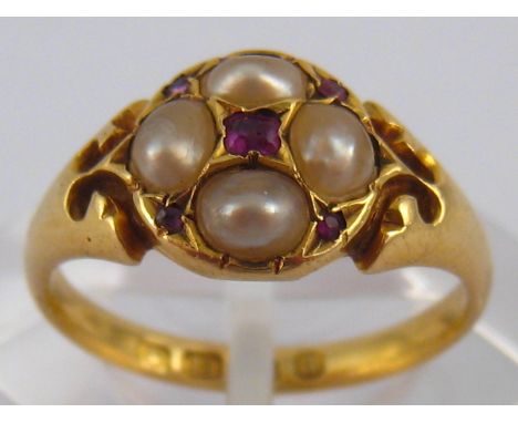 An antique 18 carat gold ruby and split pearl ring, hallmarked Birmingham 1900, ring size L, 3.7 gms.
