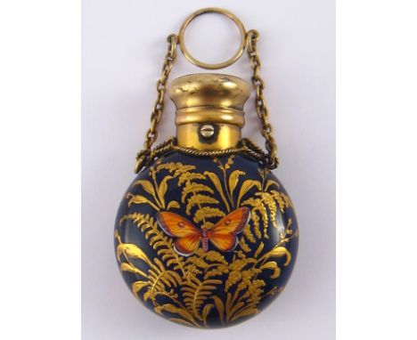 A fine Victorian silver gilt mounted cobalt blue perfume flask with enamel butterflies in gold fern foliage applique and fing