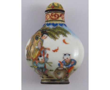A Chinese metal snuff bottle finely enamelled with children playing. ht. 6cm. 