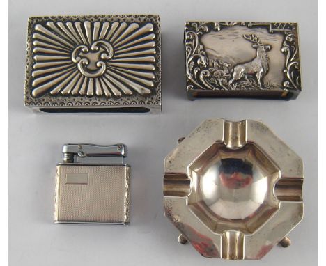 Two silver matchbox covers, one on ball feet with "Monarch of the Glen"embossed scene, Birmingham 1907, one Victorian with em